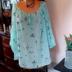 Blue blouce with delicate flowers & leaf design.